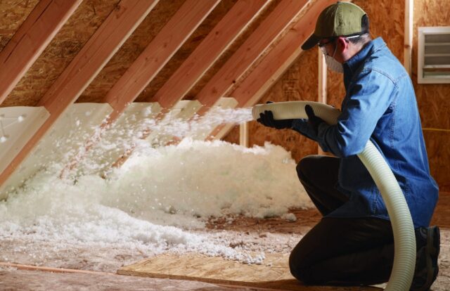 Blown-in fiberglass insulation installer.