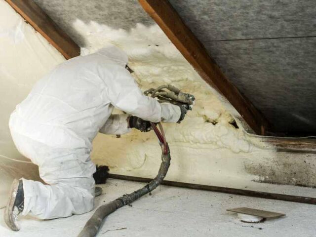 Spray foam insulation installer