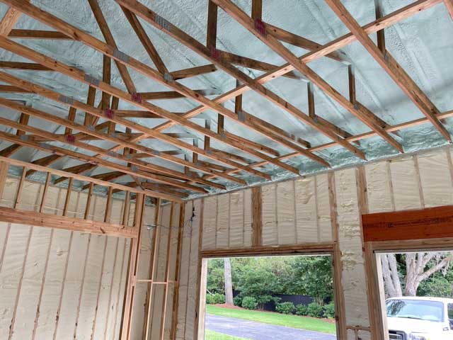 Closed-cell spray foam insulation, installed in new home's walls.