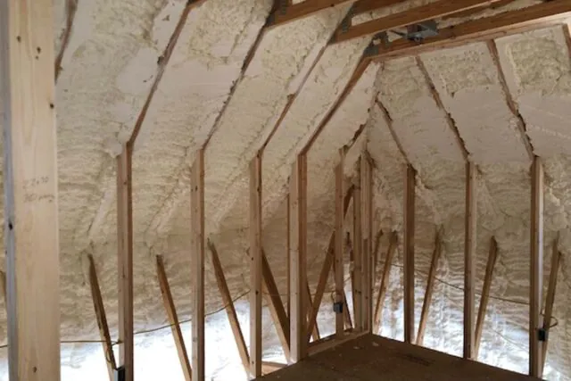 pray foam insulation applied to the roof deck and rafters of an unvented attic in a Tallahassee new construction home by Allweather Insulation.